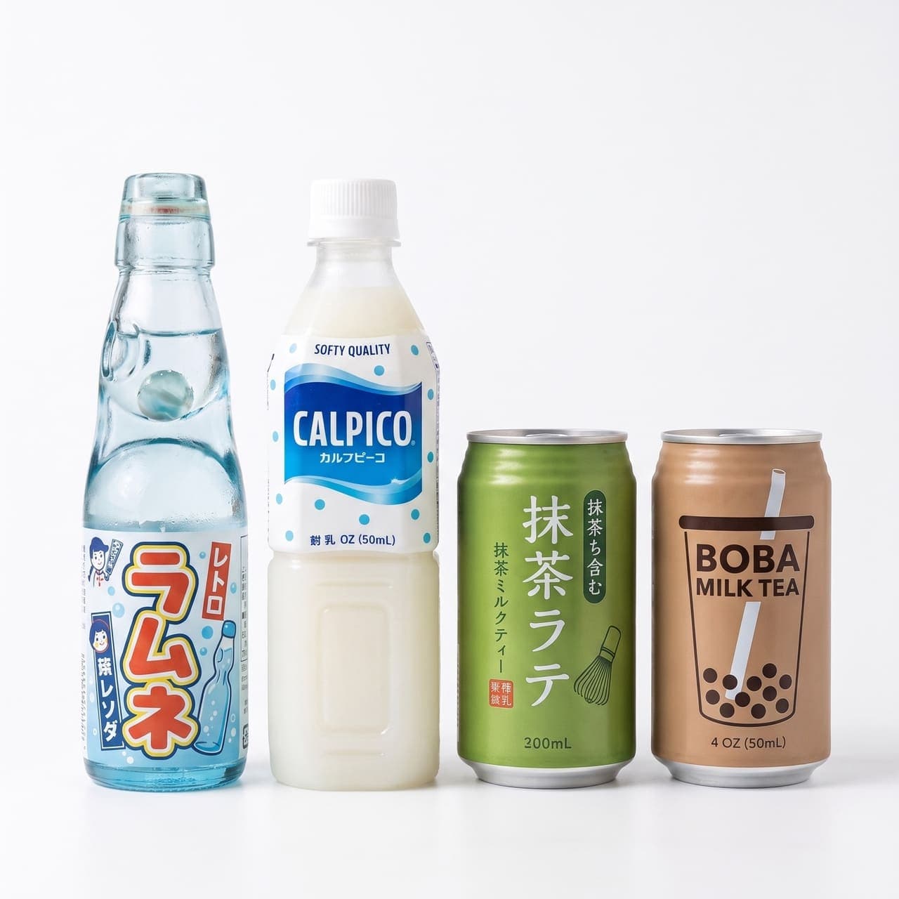 Japanese drinks: a glass Ramune bottle, Calpico, a matcha latte can, and a boba milk tea can on a white studio background
